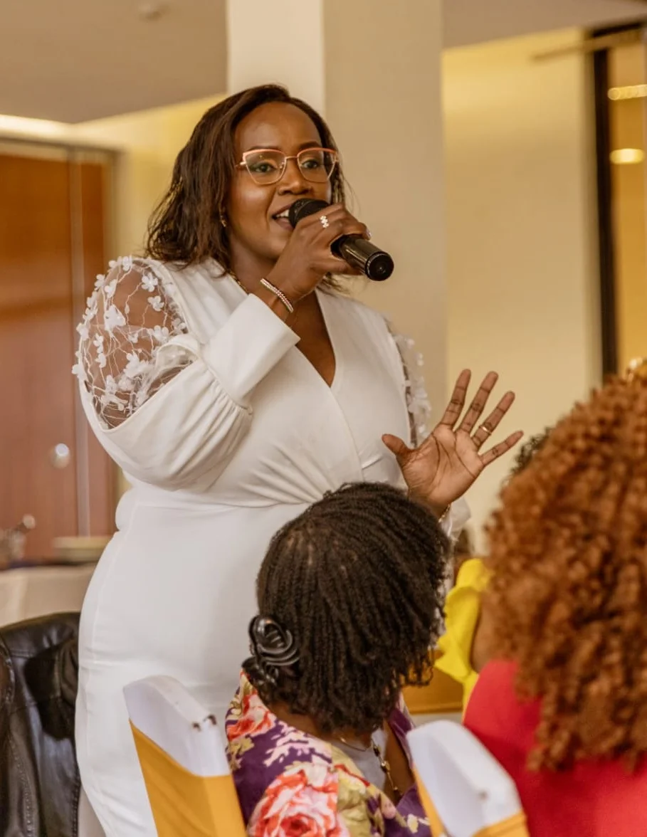 Alice Mbugua - Christian speaker delivering powerful message at women's conference